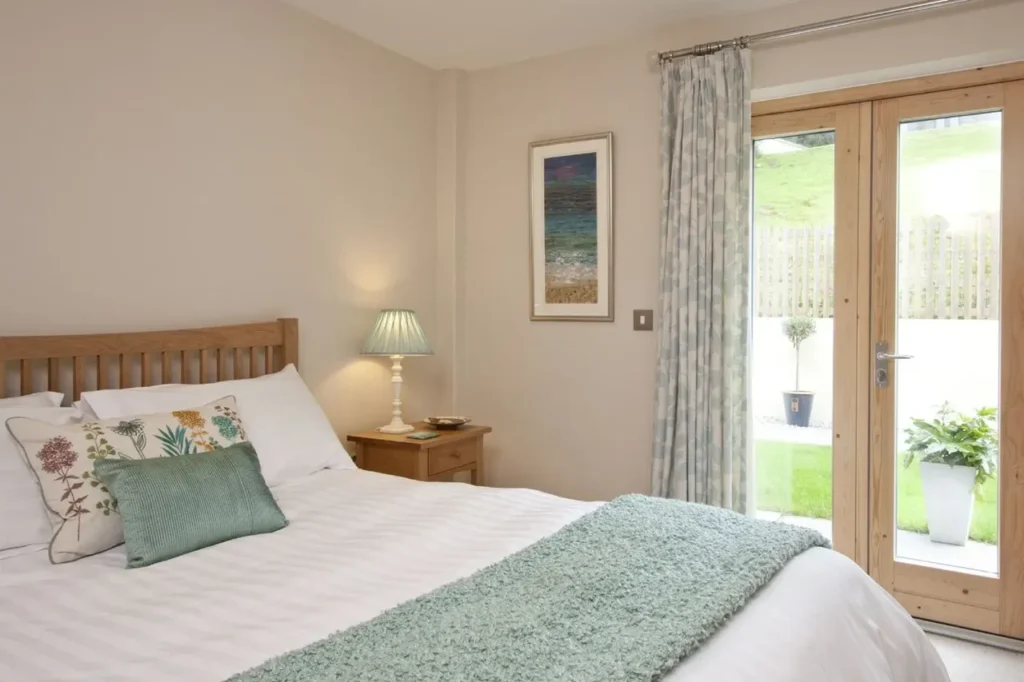 Open plan living area inside an eco lodge for sale